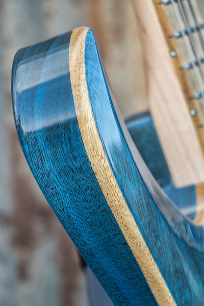 Wood grain detail photo of custom-built guitar by State College photographer Rusty Glessner