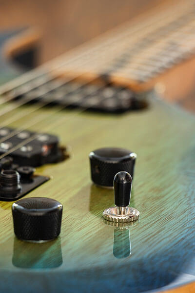 Knob close-up photo of custom-built guitar by State College photographer Rusty Glessner