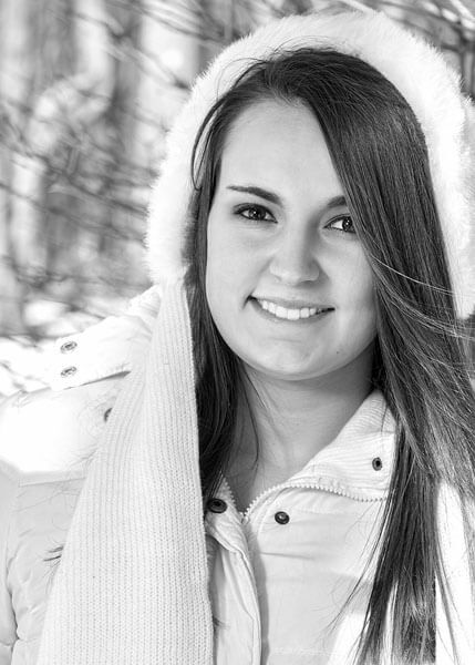 A wintertime senior portrait by State College portrait photographer Rusty Glessner