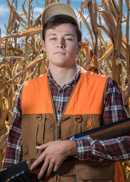 A hunting-themed senior portrait by State College portrait photographer Rusty Glessner