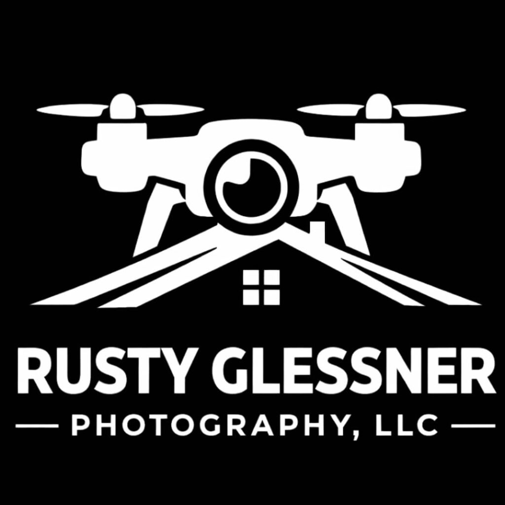 Drone with camera hovering above a rooftop graphic above the text Rusty Glessner Photography, LLC logo representing aerial photography services.